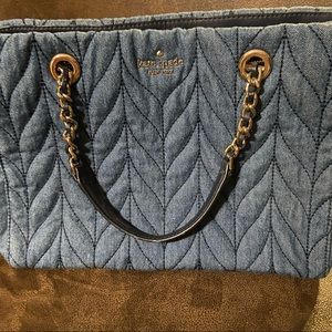 Cute Kate Spade Denim purse with gold chain handles.